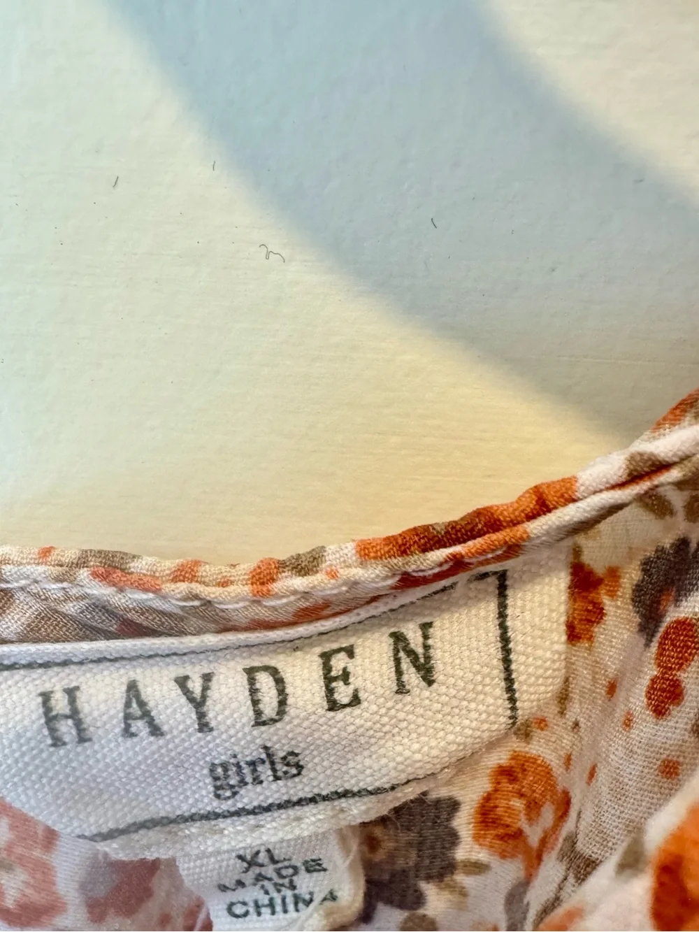 Hayden Girls Orange Floral Ruffle Hem Dress